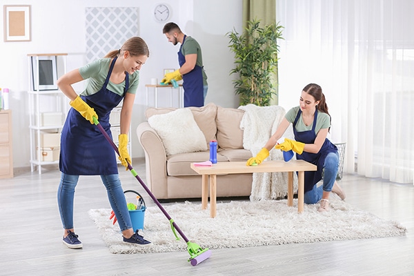Professional cleaner performing end of tenancy cleaning