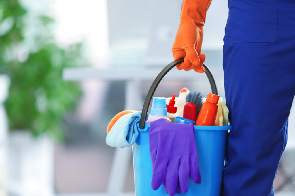 Professional cleaner from Indeed Clean performing deep cleaning in London home